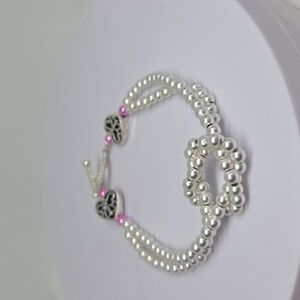 Matte Finish Silver Love Knot Beaded Bracelet In Hematite Beads.